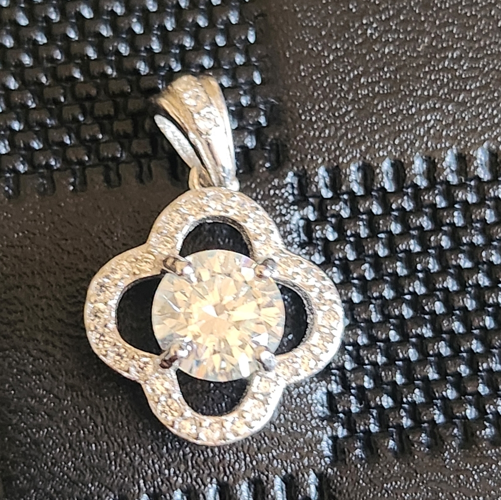Elegant Silver Pendant with Crystal Accents